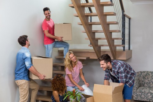 Packed boxes and furniture prepared for small removals