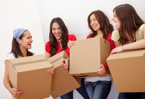 Organised storage unit with boxes and furniture for long-term storage in Goldersgreen