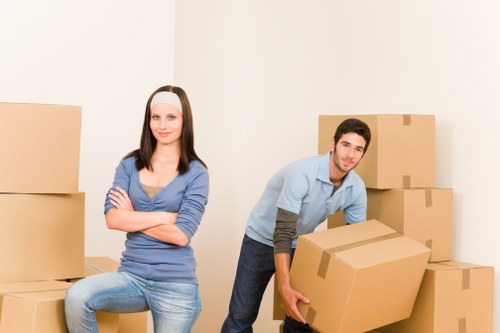 Organised storage unit with boxes and furniture in Goldersgreen