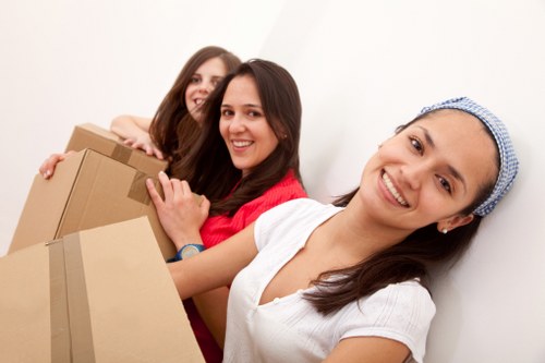 Careful furniture handling during a flat move in Golders Green